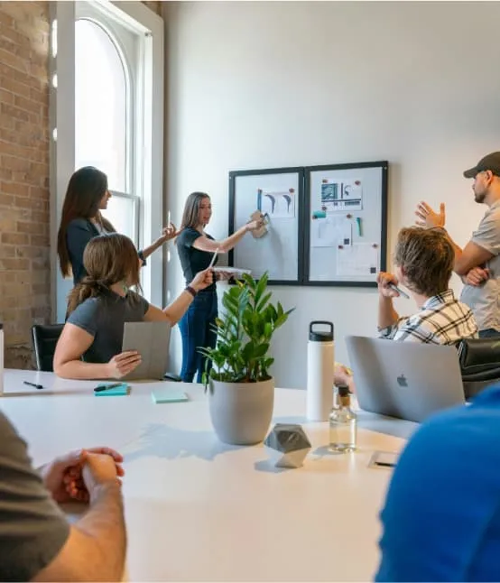 Business professionals discussing local SEO strategies during a team presentation